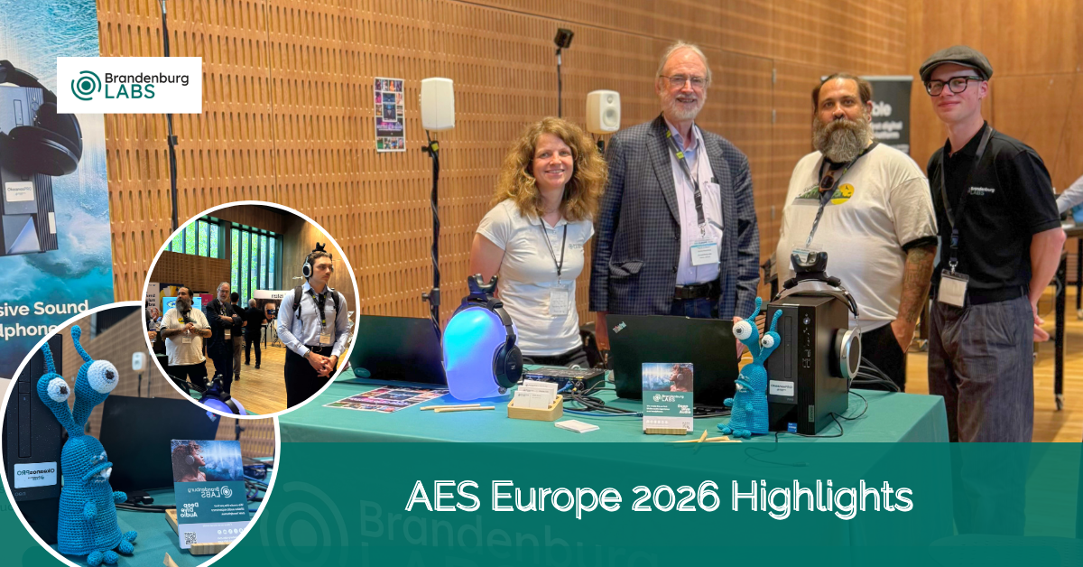 AES-Europe-2026-Convention-Recap Picture of the booth of Brandenburg Labs at AES Europe Convention 2026 showing four members of the team including Karlheinz Brandenburg